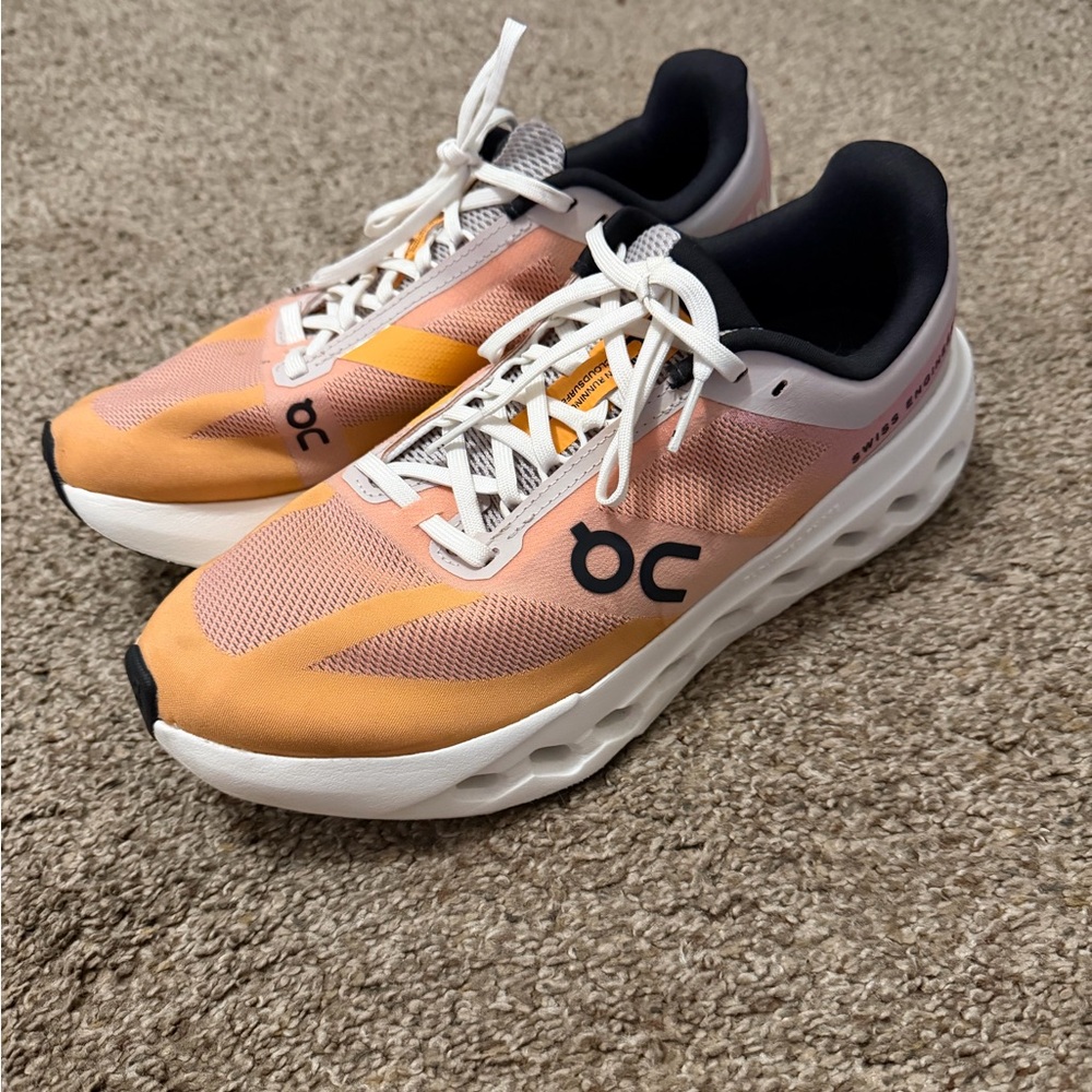 On Running Peach and White Sneaker